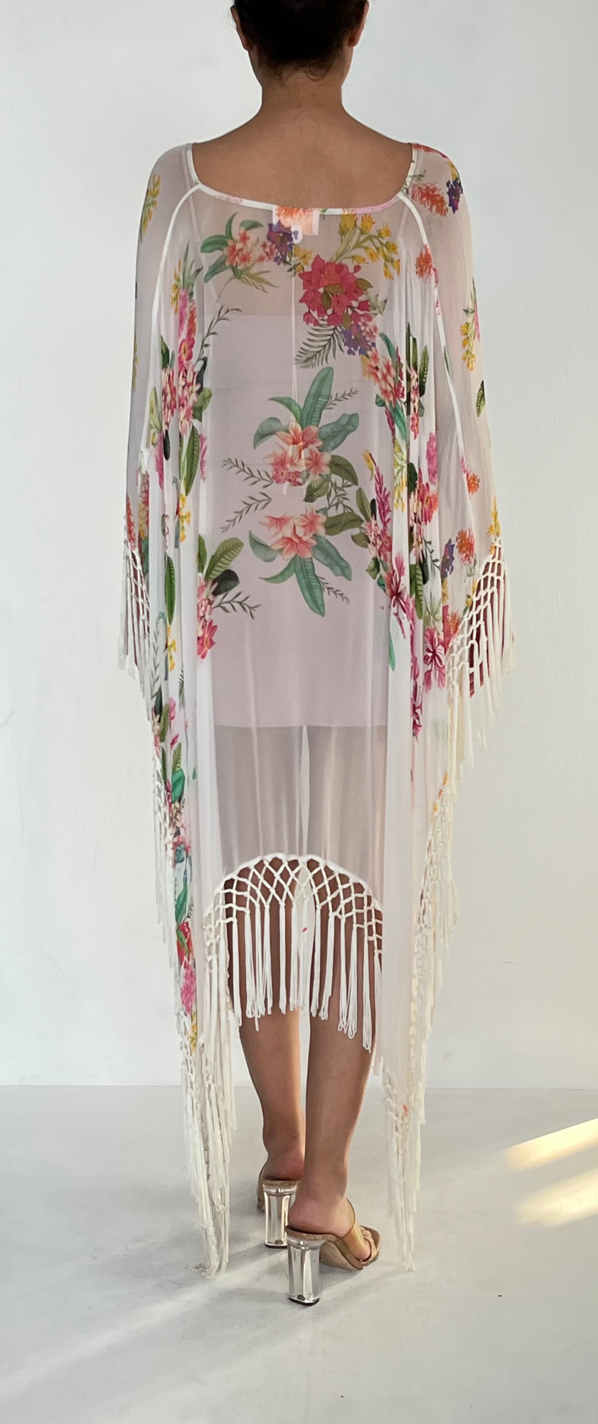 Rococo Sand | Fringes Cape | White