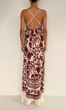 Rococo Sand | Maia Polyester Satin Lycra Cross-Back Peplum Maxi Dress | Ivory Burgundy