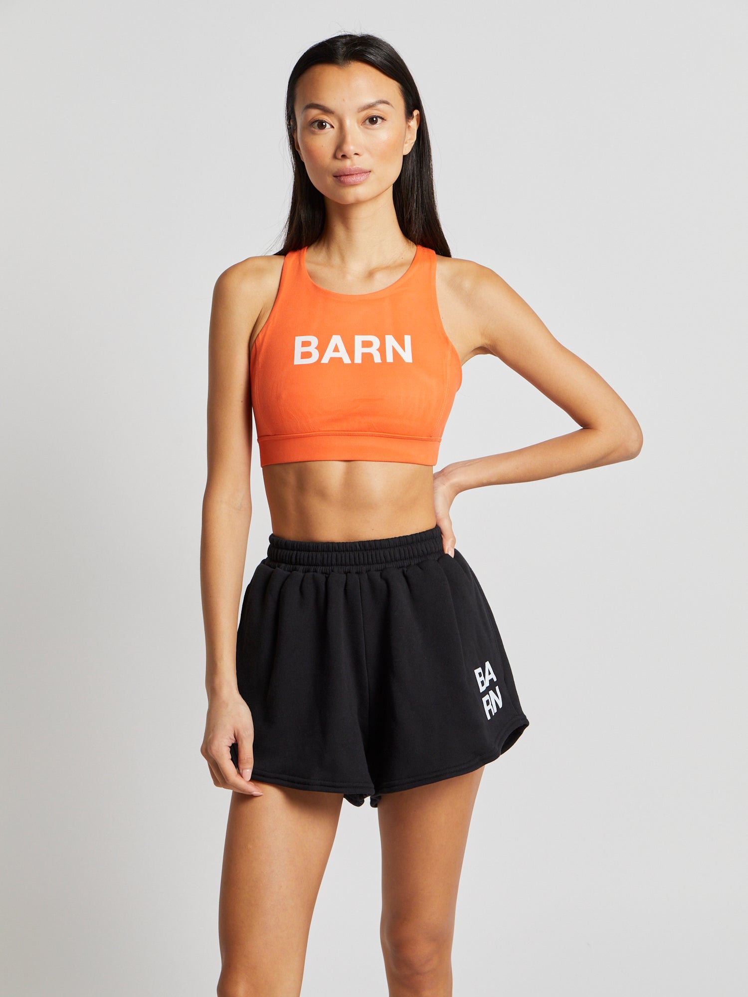 Women | Beyond Yoga | POWERBEYOND Jump Bra BARN | Sunset Orange