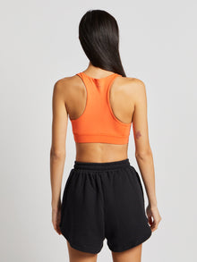 Women | Beyond Yoga | POWERBEYOND Jump Bra BARN | Sunset Orange