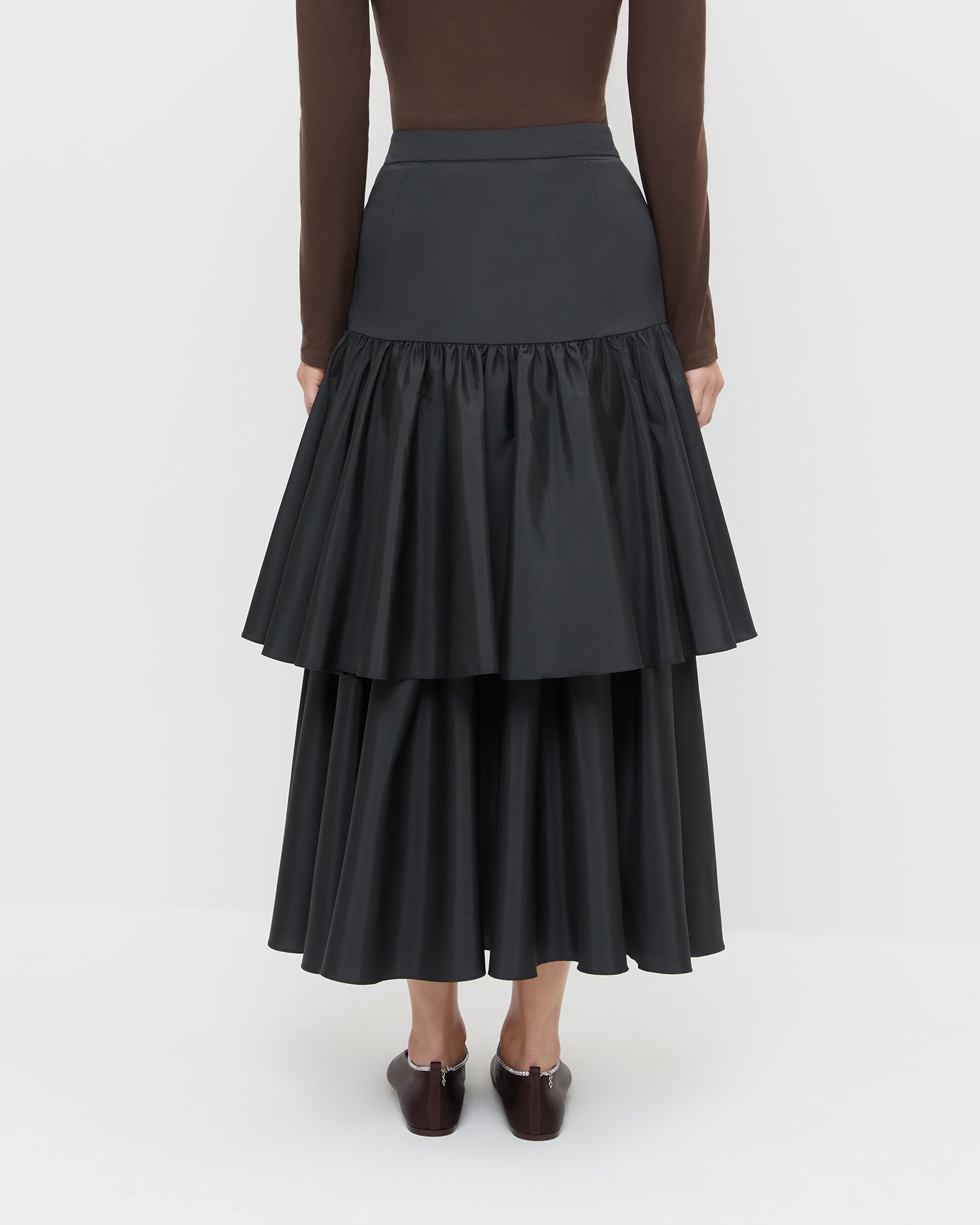Sora Skirt in black taffeta, Lumi Long Sleeve Bodysuit in chocolate brown jersey, and Emery Black/Crystal Ballet Flat.