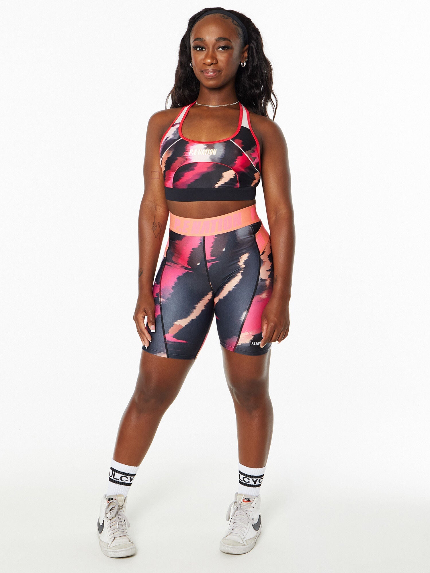 Women | P.E Nation | Fluid Sports Bra Multi Print | Black/Pink