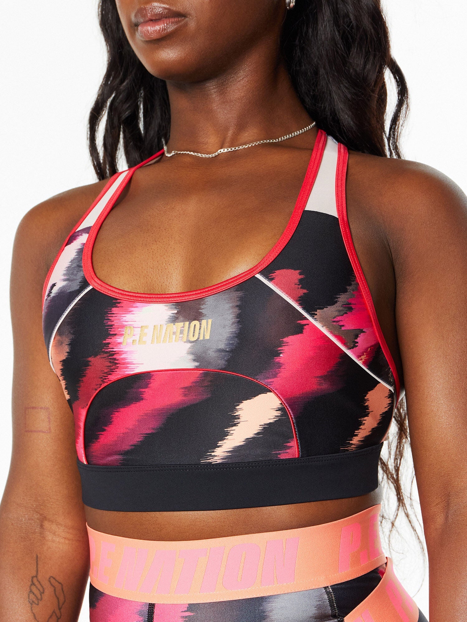 Women | P.E Nation | Fluid Sports Bra Multi Print | Black/Pink