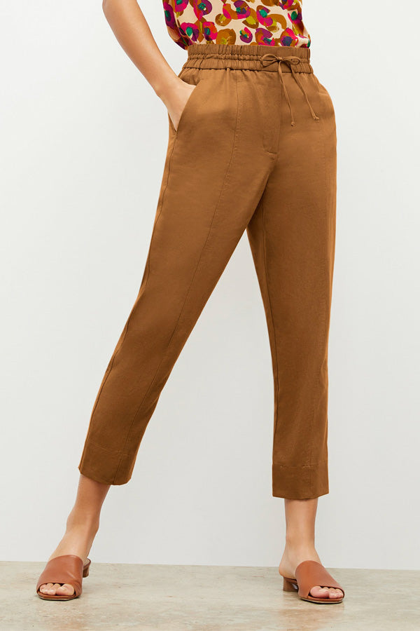 Front image of a woman wearing the Shane Pant in Acorn | Exclude