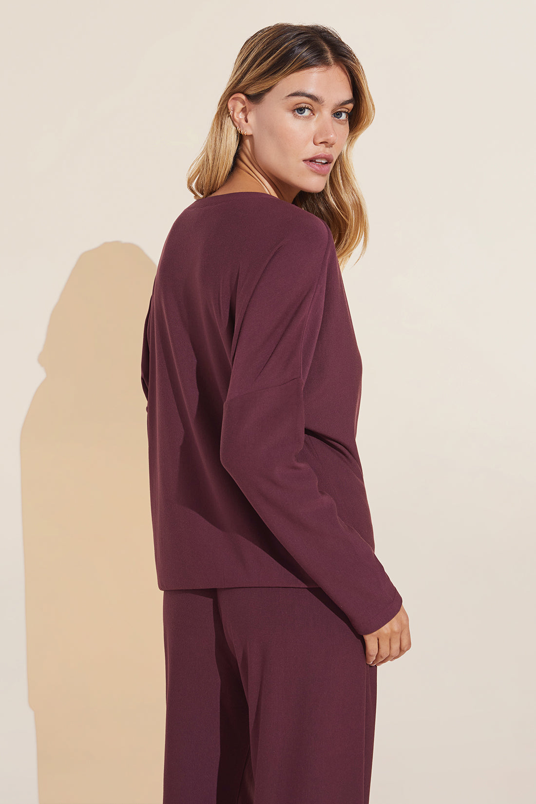 Model wears Softest Sweats Plush TENCEL™ Top in mulberry.