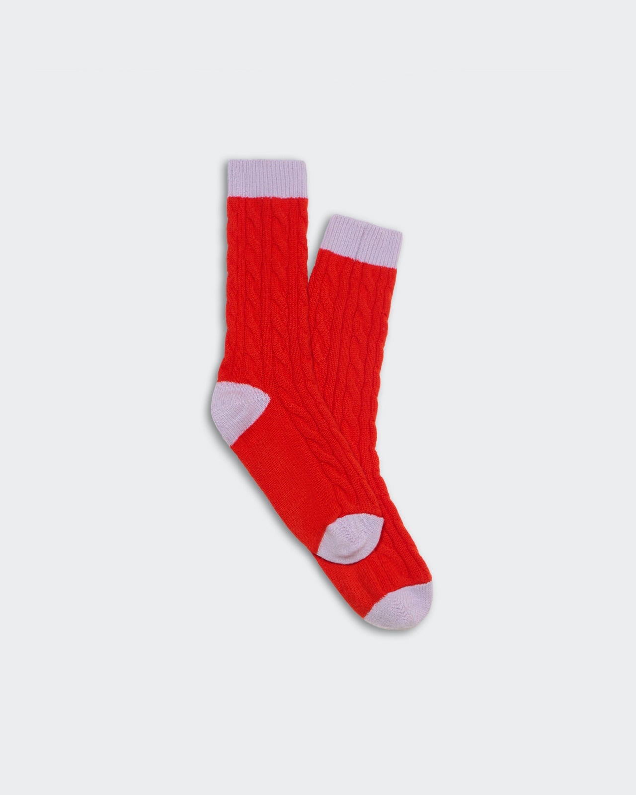 Unisex cable knit cashmere socks in chili red with dusk colorblock toe, heel, and cuff, nylon reinforced perfect fit.