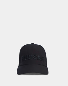 The ALFIE - 9424004 Black unisex baseball cap by Rudsak features a mesh back and bold black RUDSAK embroidery on the front, shown against a plain light gray background.