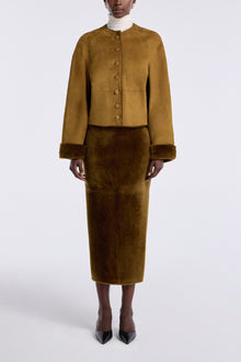 Model is wearing the Nour Hammour Willow Cropped Shearling Cardigan Chartreuse - Front Closed