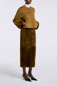 Model is wearing the Nour Hammour Willow Cropped Shearling Cardigan Chartreuse - Three Quarters