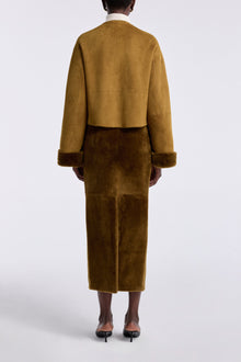 Model is wearing the Nour Hammour Willow Cropped Shearling Cardigan Chartreuse - Back