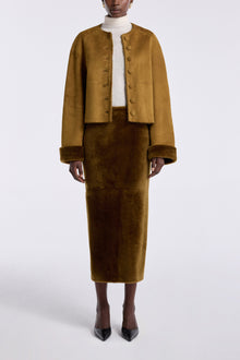 Model is wearing the Nour Hammour Willow Cropped Shearling Cardigan Chartreuse - Front Open
