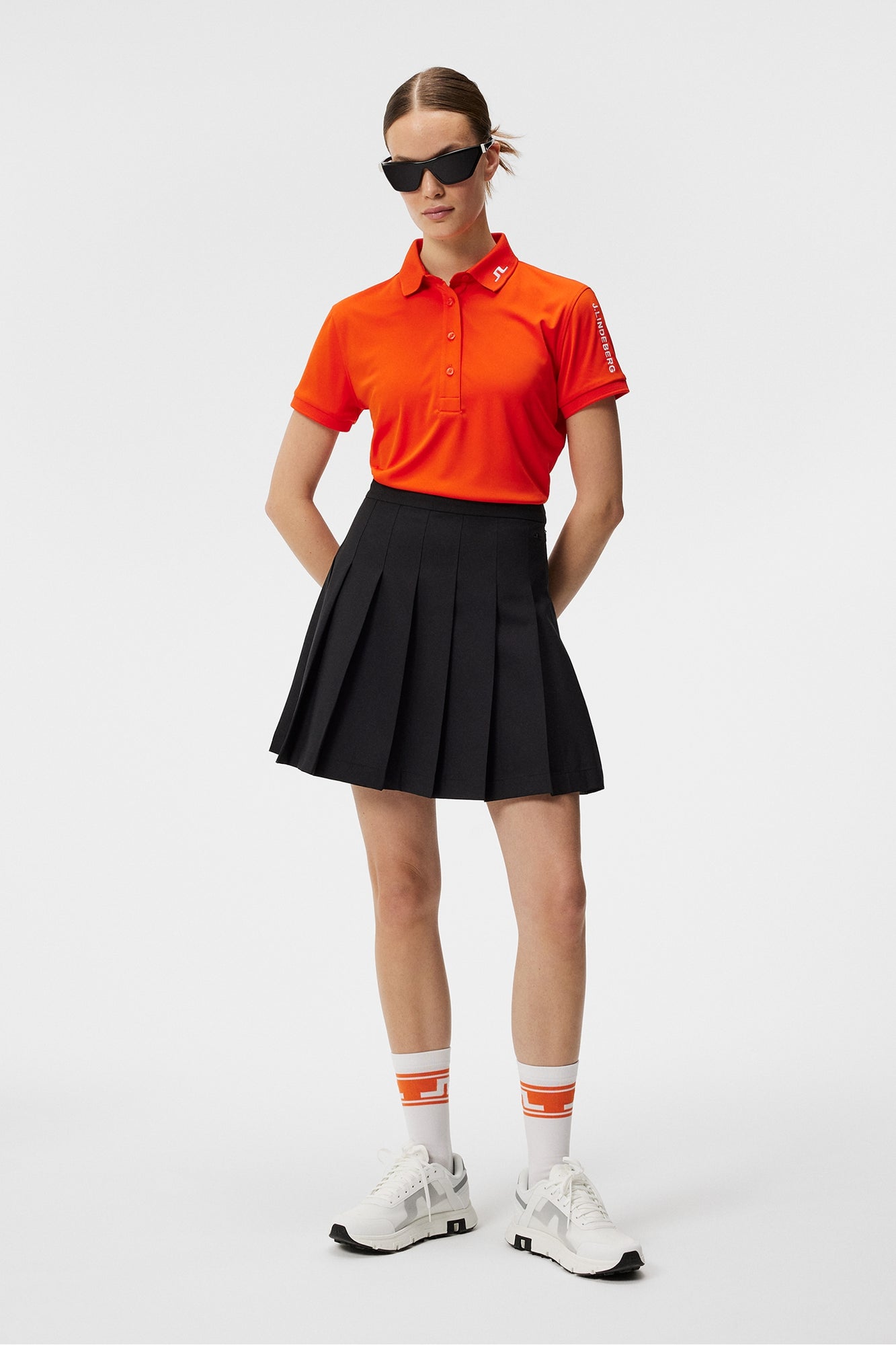 Women | Tour Tech Polo | Tangerine Tango