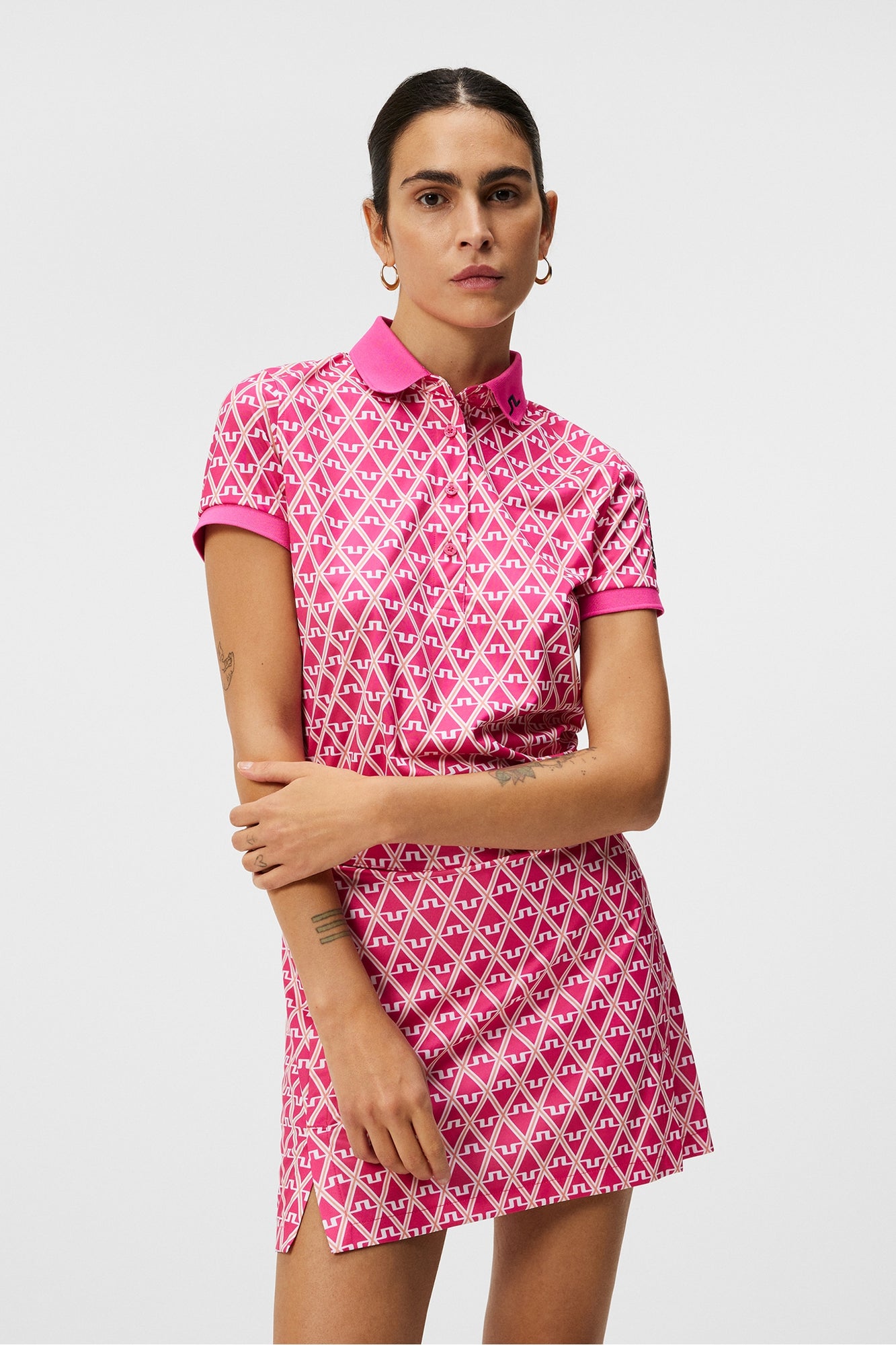 Women | Tour Tech Print Polo | Geo Fuchsia Purple
