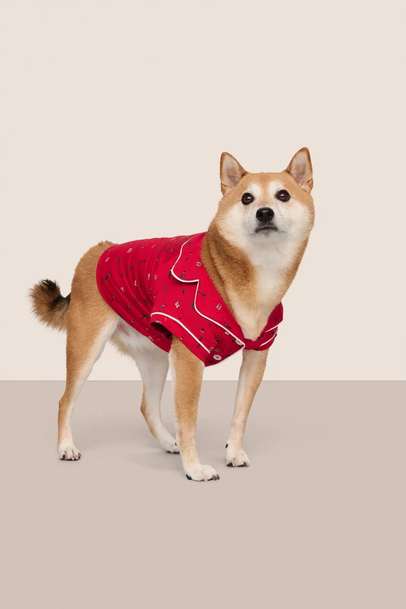 Model is wearing Gisele Printed TENCEL Modal Pet PJ  in Nutcracker Holly Red/Ivory