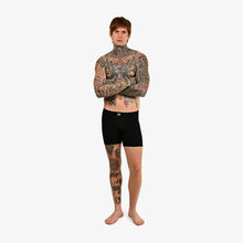 James wears a size S