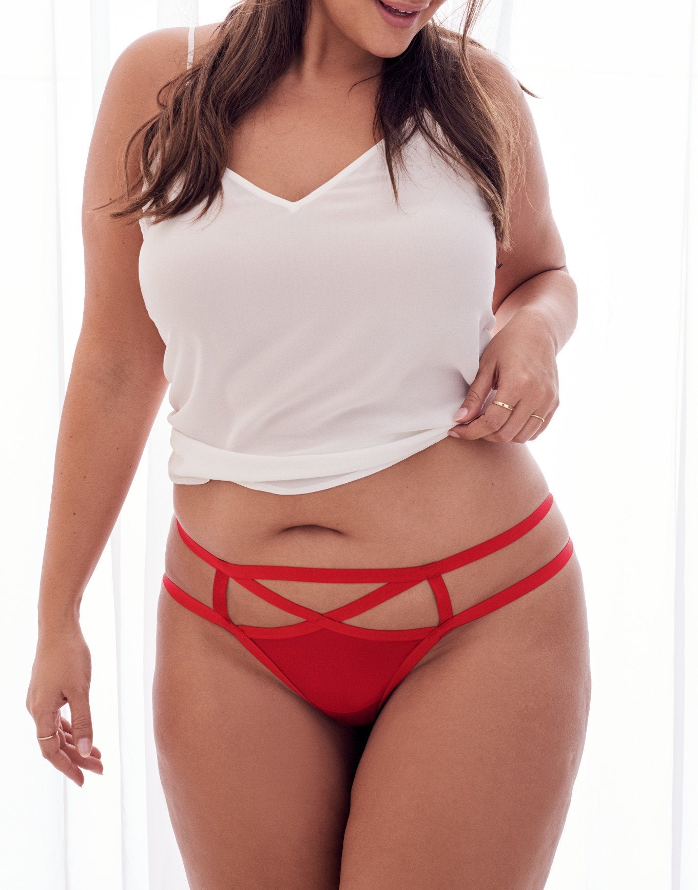 Adore Me Nehrissa Strappy Thong in color Jester Red and shape thong