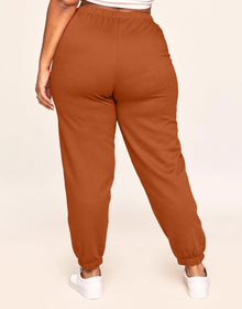 Adore Me Kaylie Classic Fleece Sweatpant in color Rust and shape pant
