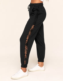 Adore Me Hila Casual-Fit Sweatpant With Lace Detail in color Noir and shape pant