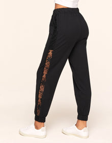Adore Me Hila Casual-Fit Sweatpant With Lace Detail in color Noir and shape pant