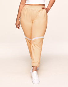 Adore Me Harmoney Fashion Jogger With Mesh Detail in color Peach Fuzz and shape jogger