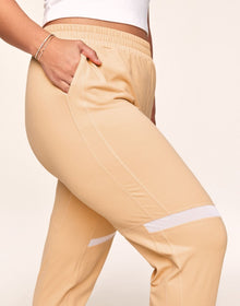 Adore Me Harmoney Fashion Jogger With Mesh Detail in color Peach Fuzz and shape jogger