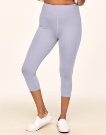 Adore Me Haley Heathered Crop Heather Compression Activewear Crop Legging in color Lavender Blue Heather and shape legging