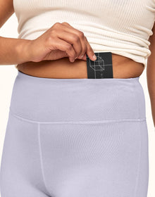 Adore Me Haley Heathered Crop Heather Compression Activewear Crop Legging in color Lavender Blue Heather and shape legging