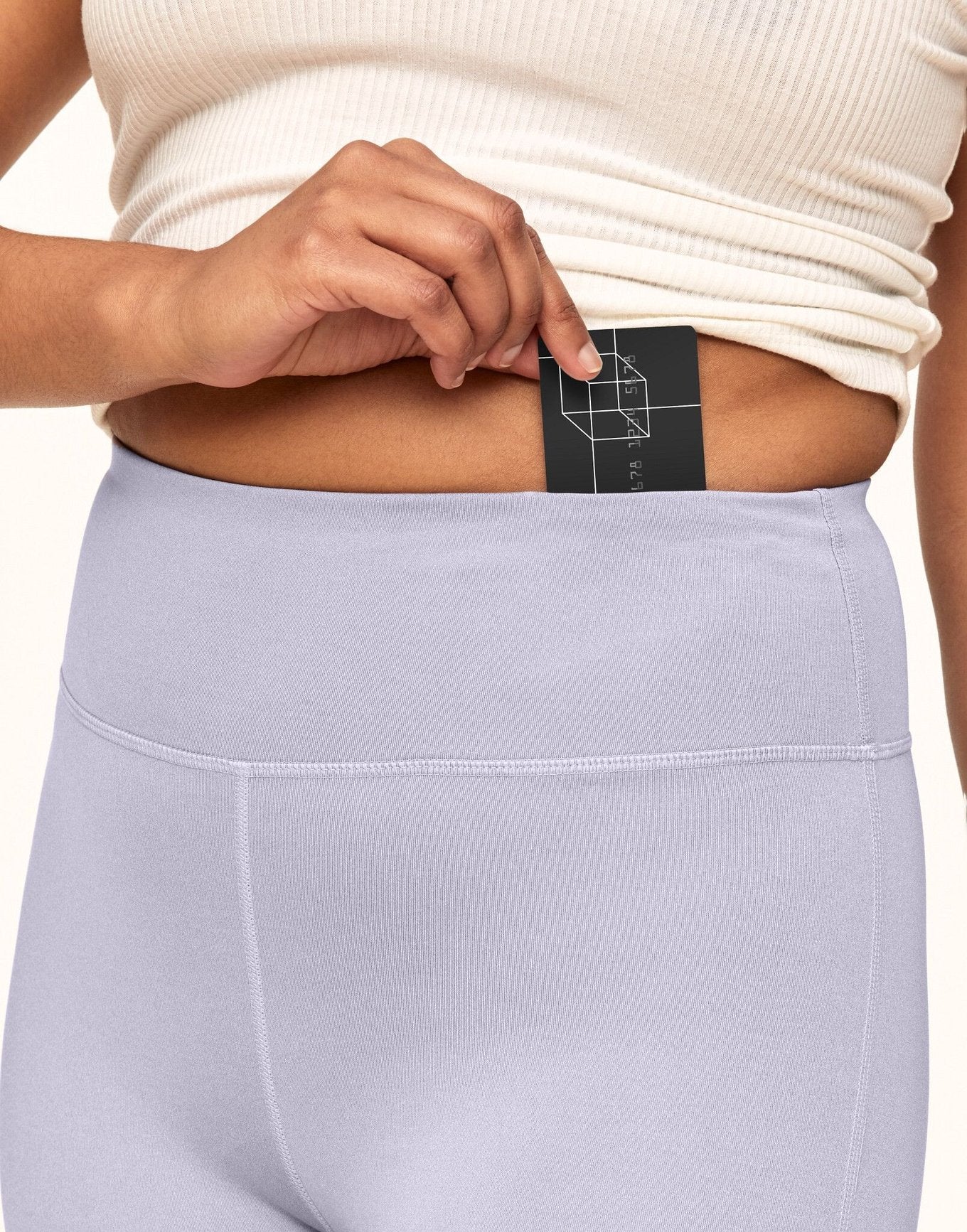 Adore Me Haley Heathered Crop Heather Compression Activewear Crop Legging in color Lavender Blue Heather and shape legging
