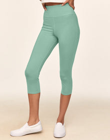Adore Me Haley Heathered Crop Heather Compression Activewear Crop Legging in color Green Come True Heather and shape legging