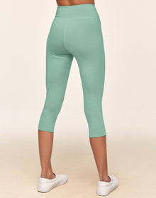 Adore Me Haley Heathered Crop Heather Compression Activewear Crop Legging in color Green Come True Heather and shape legging