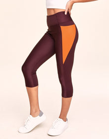 Adore Me Bailey Brushed Crop Super-Soft Active Crop with Pockets in color Oxblood and shape legging