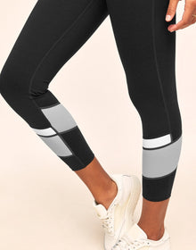 Adore Me Haley Heather Colorblock 7/8 High-waist 7/8 Legging with Phone Pocket in color Noir Dark Heather and shape legging