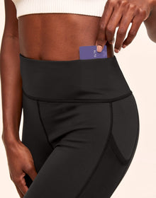 Adore Me Ava Cozy Legging Cozy Active Legging with Pockets & Mesh Details in color Noir and shape legging