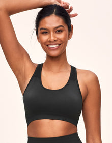 Adore Me Skylar Seamless Bra Seamless Bra in color Noir and shape sports bra