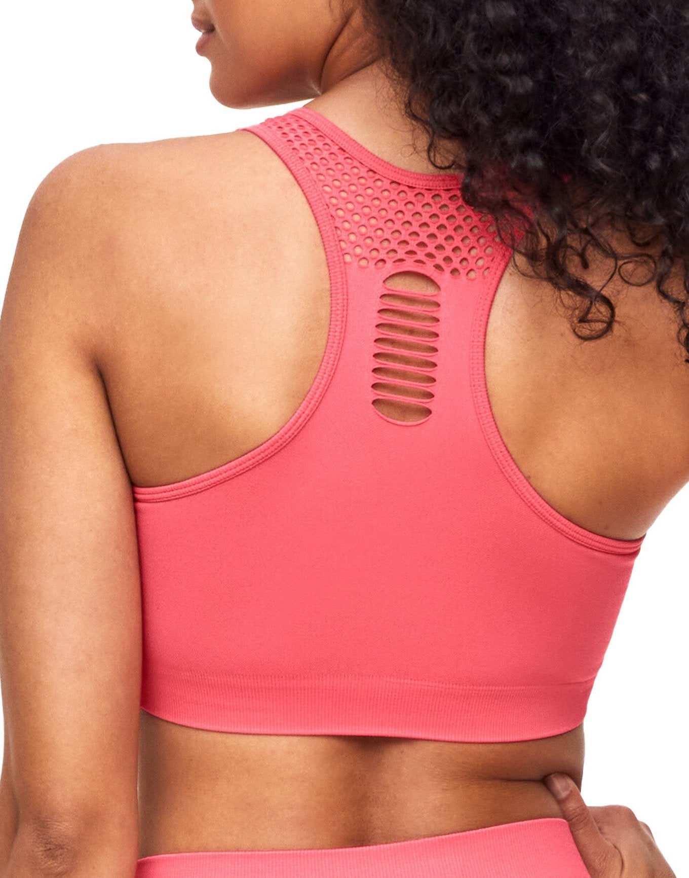 Adore Me Skylar Seamless Bra Seamless Bra in color Sunkist Coral and shape sports bra