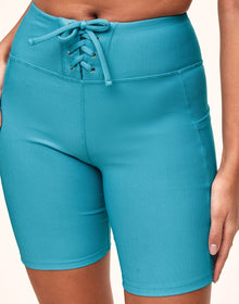 Adore Me Remy Rib Lace-Up Biker Short Ribbed Biker Shorts in color Delphinium Blue and shape short