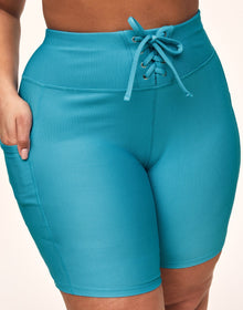 Adore Me Remy Rib Lace-Up Biker Short Ribbed Biker Shorts in color Delphinium Blue and shape short