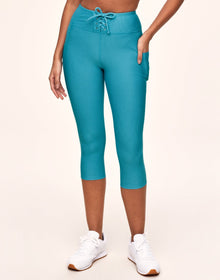 Adore Me Remy Rib Lace-Up Crop Ribbed Crop Bottoms in color Delphinium Blue and shape legging