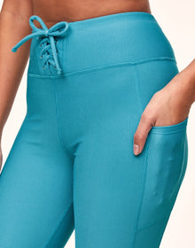 Adore Me Remy Rib Lace-Up Crop Ribbed Crop Bottoms in color Delphinium Blue and shape legging