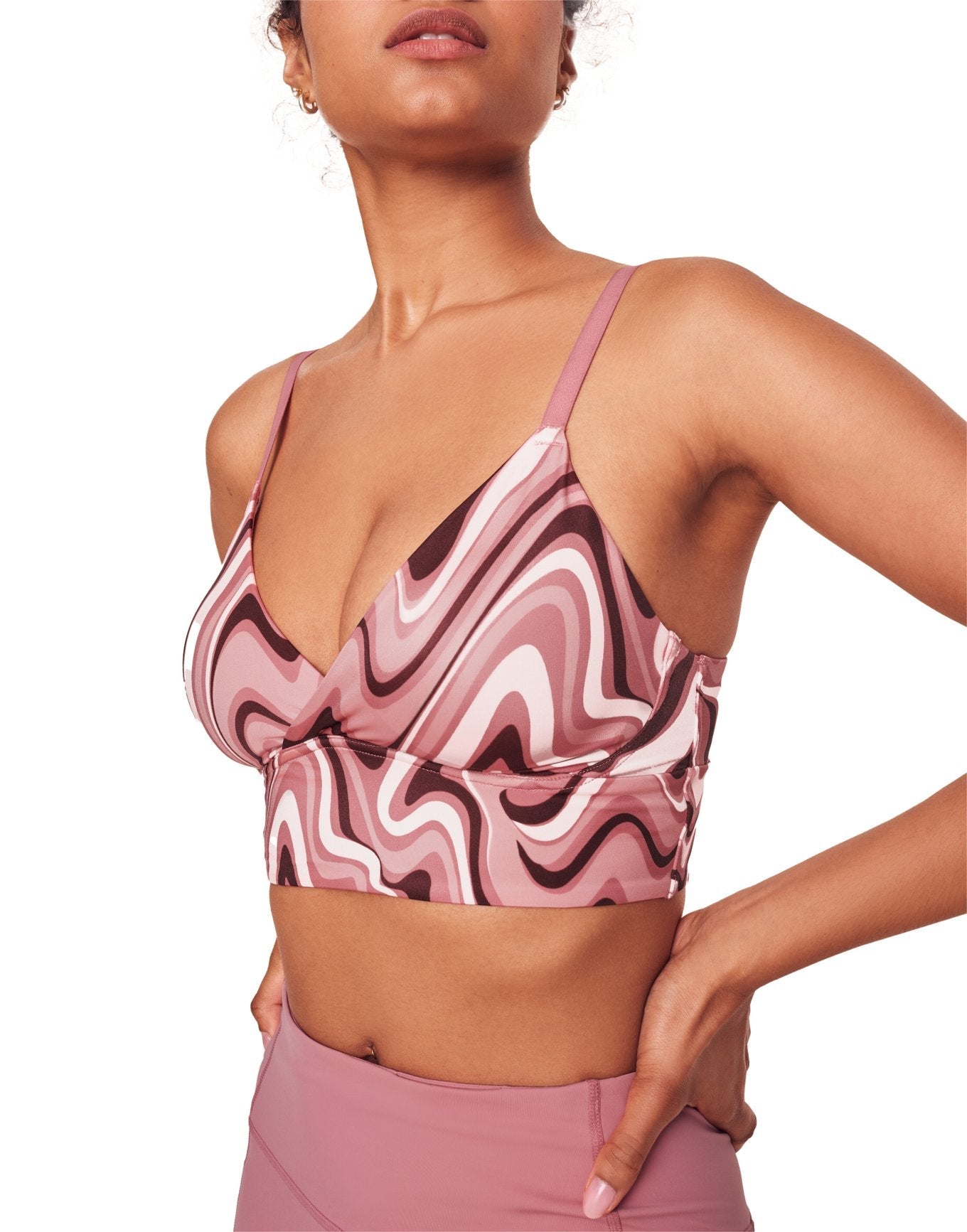Adore Me Kali Low-Impact Sports Bra in color Feelin' Groovy C02 V2 and shape sports bra