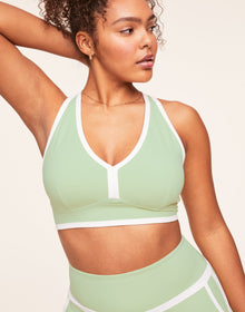 Adore Me Tori Plunge Sports Bra Low-Impact Sports Bra in color Reed and shape sports bra