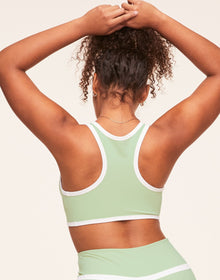 Adore Me Tori Plunge Sports Bra Low-Impact Sports Bra in color Reed and shape sports bra