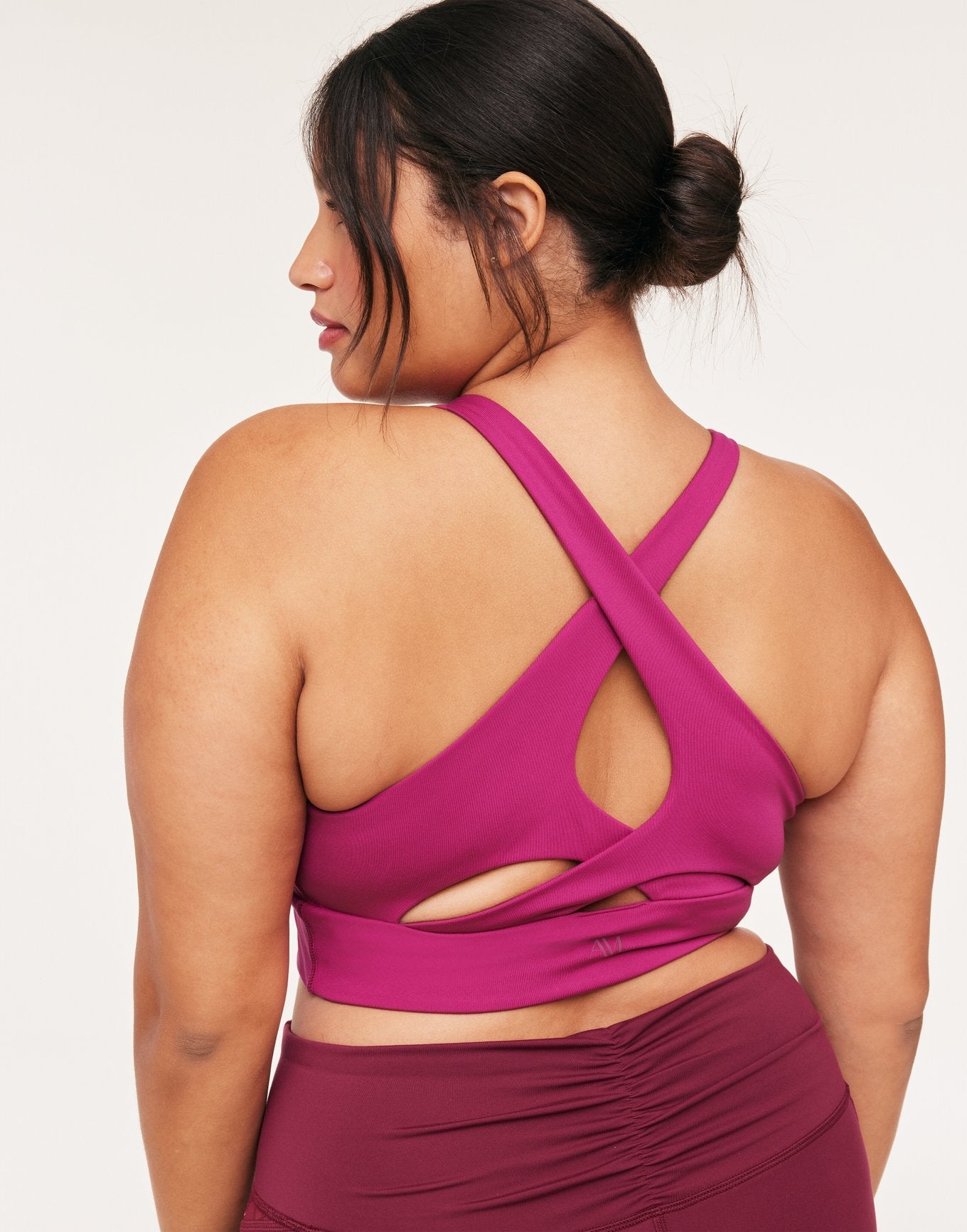 Adore Me Lotus Crossover Bra Lotus Medium Support Sports Bra in color Festival Fuchsia and shape sports bra