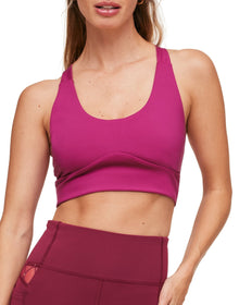 Adore Me Lotus Crossover Bra Lotus Medium Support Sports Bra in color Festival Fuchsia and shape sports bra
