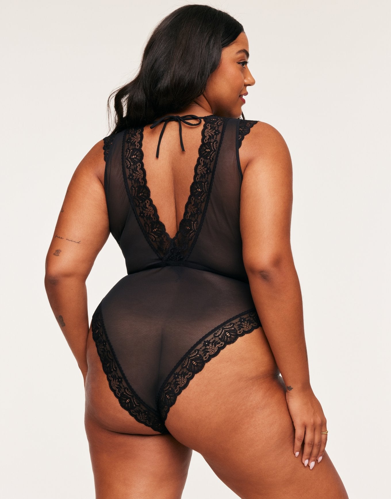 Adore Me Amanda Bodysuit in color Jet Black and shape bodysuit