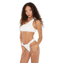 Front-facing pose of model in Aimi Bikini Bottom white, accentuating knotted hip details and minimal silhouette. **white