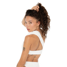 Back view of model in the Aimi Bikini Top, highlighting the thick one-shoulder knotted strap and open back silhouette. **white