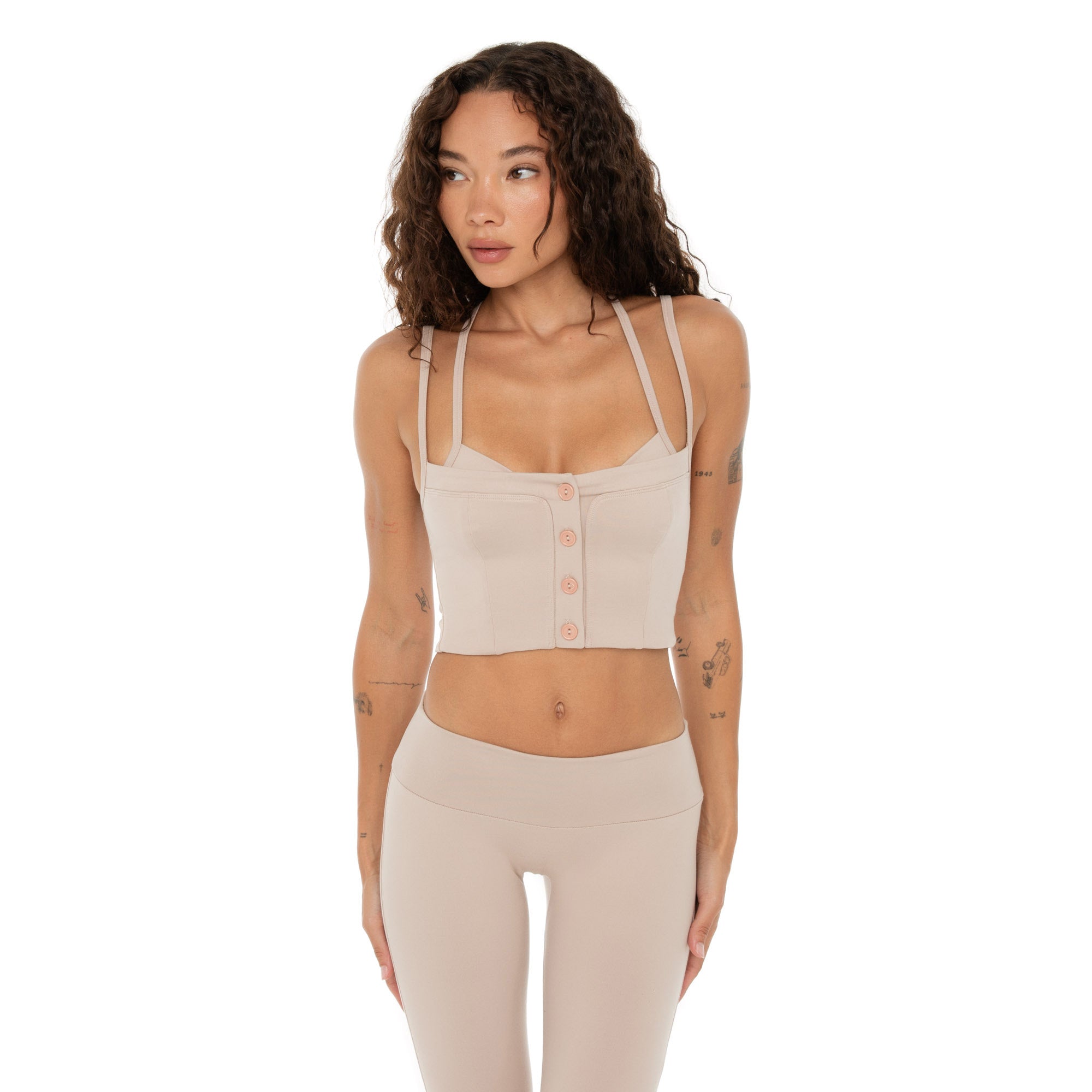 Front view close-up of Kylen Top in nude with functional center buttons. **nude