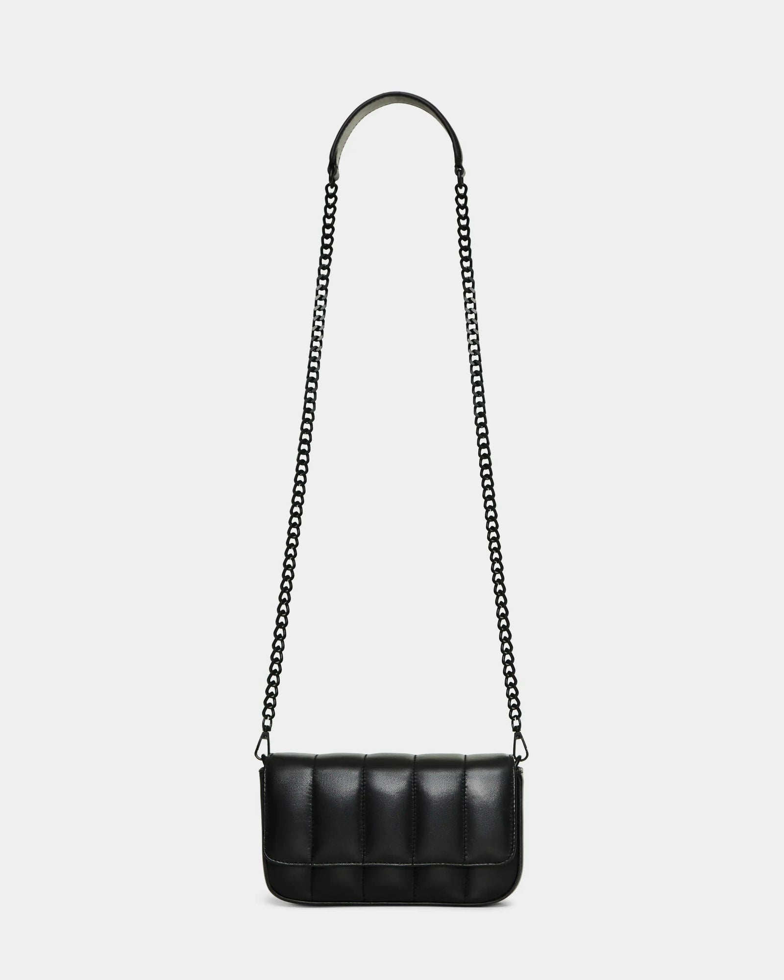 The Rudsak CHARLI X - 8324009 Black is a stylish black quilted leather bag with a rectangular design and long chain strap, shown on a white background. This chic convertible crossbody offers elegance and versatility for any occasion.