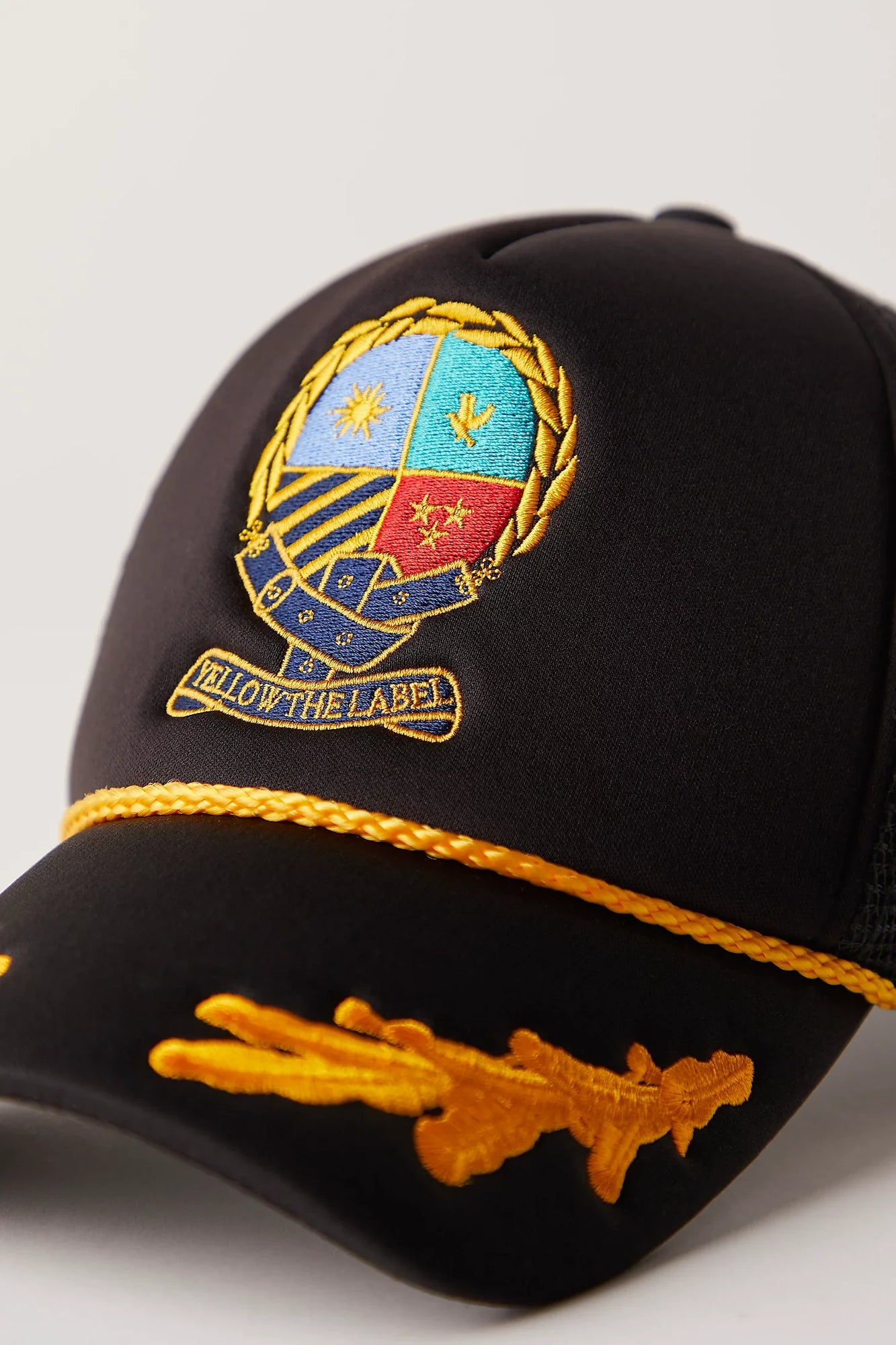 Herald Crest Trucker Hat | Black